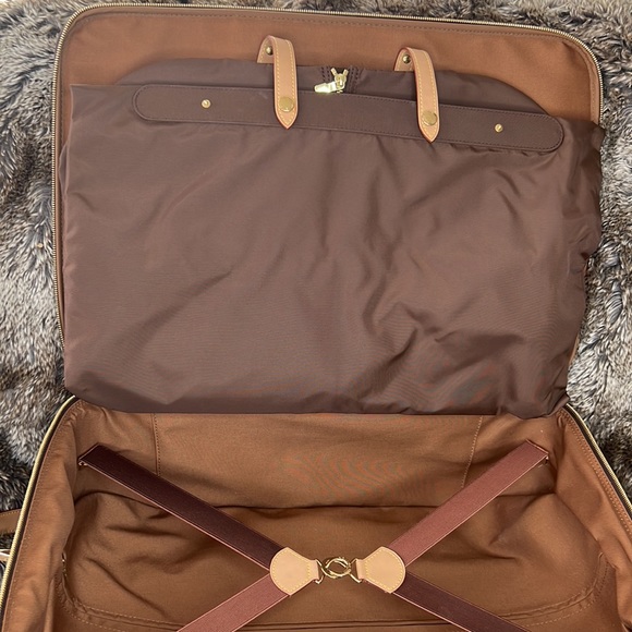 Louis Vuitton suitcase with wheels - Picture 11 of 16